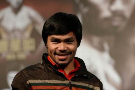 Boxer Pacquiao confident of beating American opponent Algieri