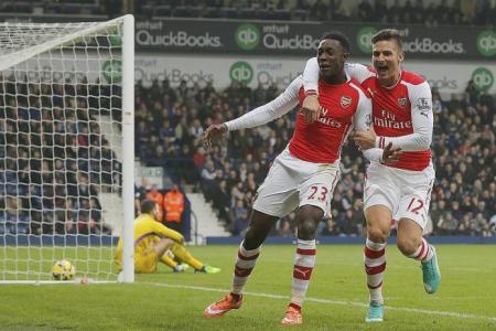 Welbeck comes to Arsenal's rescue