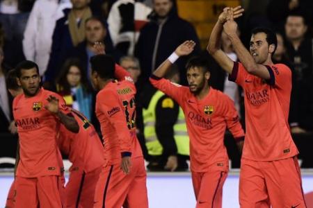 Messi hit by bottle as Barca celebrate last-minute winner against Valencia