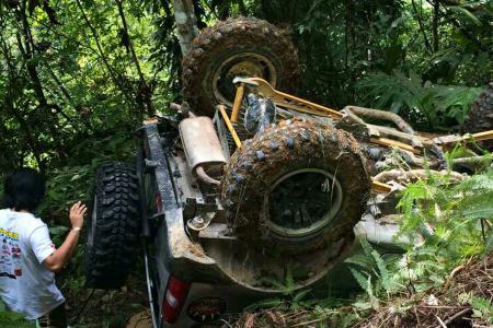  S'porean driver hurt in M'sian jungle as off-road vehicle flips downhill