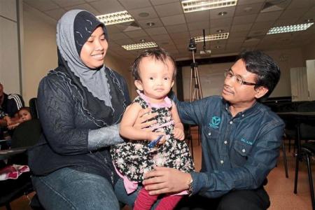 M'sian girl, 2, with abnormally large head has undergone 12 operations