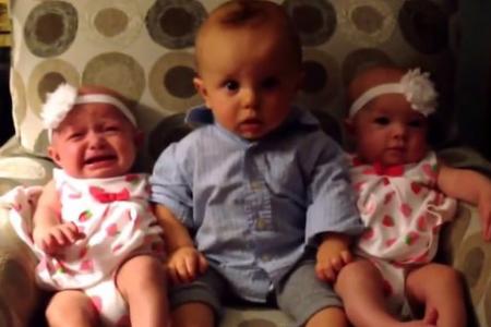 WATCH: Adorable baby boy's priceless reaction to meeting twin sisters 