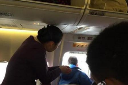 Man daringly opens plane's emergency exit door to 'get some fresh air'