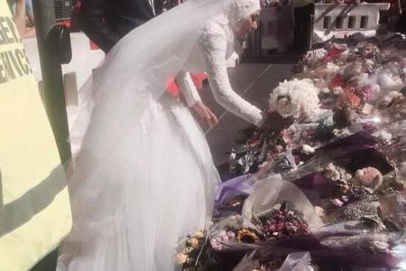 Muslim bride's bouquet at scene of Sydney Siege wins the hearts of Australians