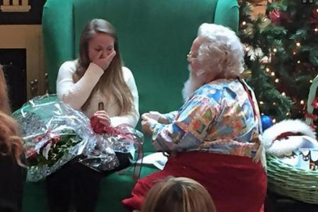WATCH: Santa proposes to woman on behalf of boyfriend serving in Afghanistan