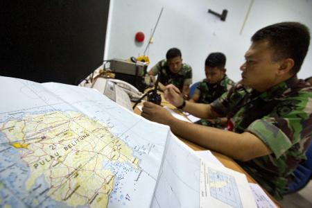 Reports of smoke being investigated says director of Indonesia's search operations