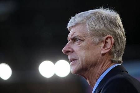 Wenger braced for top-four fight