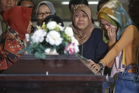 QZ8501 UPDATE DAY 6: Funeral held for AirAsia victim 