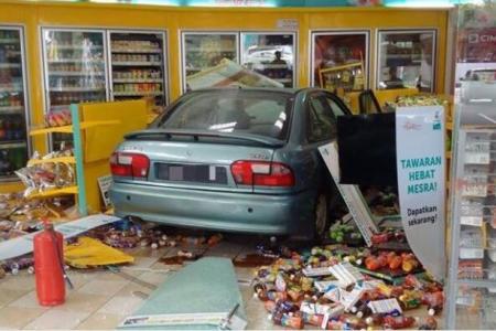 Woman, 61, rams cars into petrol station's convenience store