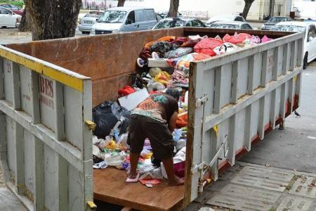 Hoarder mum and son arrested for obstructing authorities from clearing rubbish