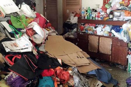 Hoarder mum and son arrested for obstructing authorities from clearing rubbish