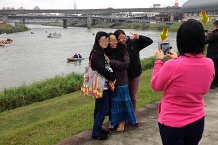This picture taken in front of TransAsia plane crash site sparks outrage