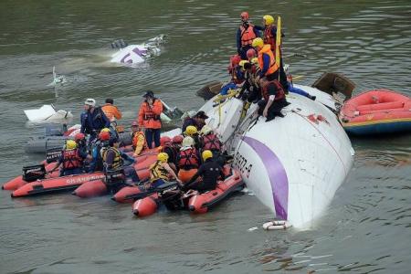 Crashed TransAsia jet pilot’s body found still clutching the joystick 