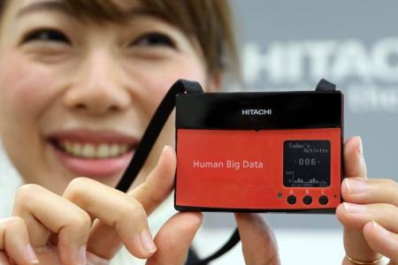 In Japan, happiness is measured by... wearable sensors