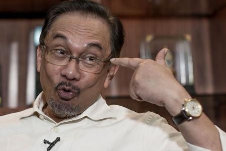 Anwar Ibrahim gets 5-year jail term for sodomy. He tells family: 'See you in some years'