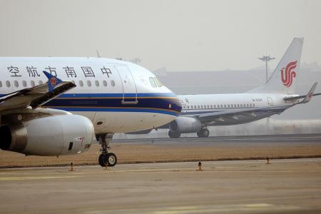 Man opens emergency exit door on China flight before take-off