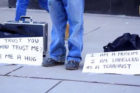 WATCH: Blindfolded Muslim man asks Canadians to show trust by hugging him