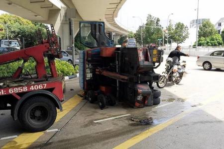 WATCH: Tow truck lands on side in Bartley Road accident 
