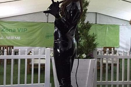 Tennis star steals the show with Catwoman suit