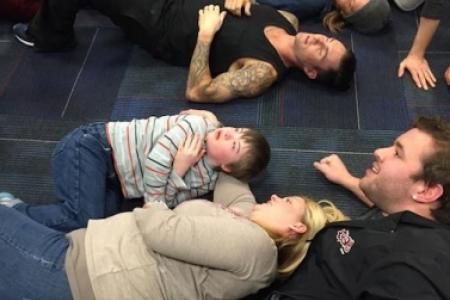 Adam Levine lies down with fan, 10, to help him during panic attack