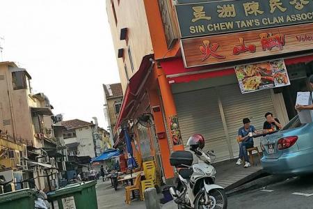 They gamble openly in Geylang alley
