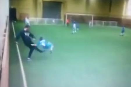 WATCH: Russian coach kicks boy during children's football match