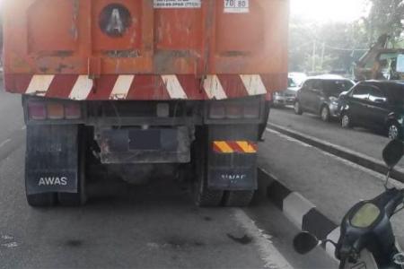 Mum disobeys traffic cops, rides motorbike into lorry's path & causes son's death
