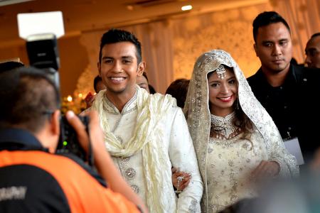 What kind of person is Taufik's bride? According to her sister, she's...