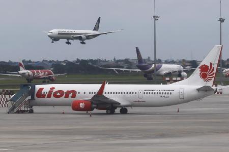 Passengers scramble from smoking Lion Air jet before takeoff 