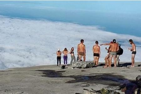 Sabah locals want nude tourists punished for "causing earthquake"