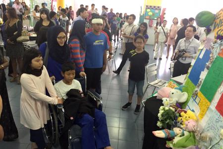 Kinabalu tragedy: Injured boys get standing ovation in visit to school memorial from hospital