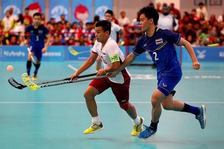 S'pore floorballers survive scare to beat Thailand in final