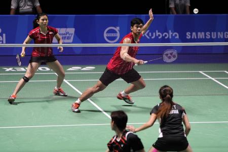 Malaysia and Indonesia share badminton spoils on exciting final day
