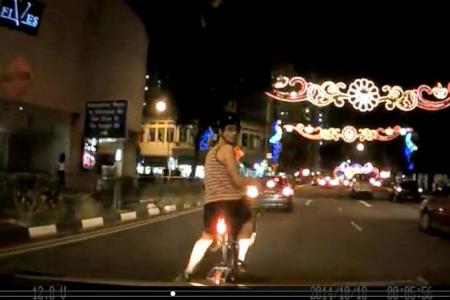 Man fined for throwing bicycle on car that hit him