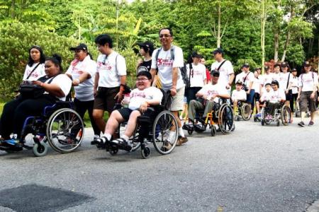 100 people in wheelchairs visit Pulau Ubin