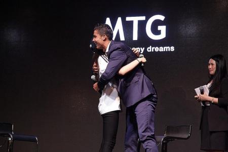 Chinese fan gets hug and kiss on stage from superstar Ronaldo