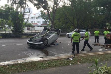 Driver, 21, dies after car overturns on Bukit Timah Road