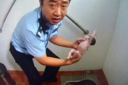 Baby found abandoned in Beijing toilet