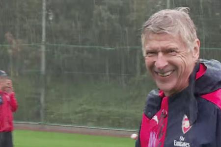 Arsene smiles! Arsenal players, mascot take a tumble in Dizzy Goals challenge