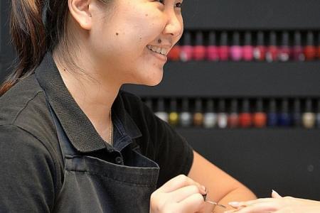 Manicurist earns accountant's wage thanks to ringgit plunge