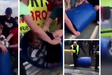 WATCH: Grimsby fans celebrate win by pushing a friend down the stairs in a bin
