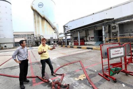 Safety officer cleared trailers with hydrogen gas from raging fire at Jurong factory