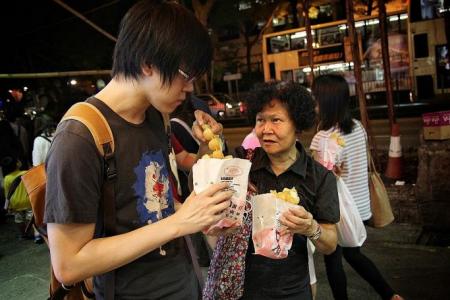 Son surprises Singaporean McRefugee mum with visit in Hong Kong 