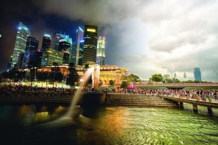 Singapore photographer's pictures show day and night in a snap