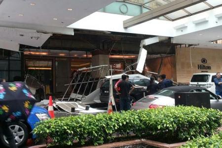Driver and boss escape Hilton hotel driveway ceiling collapse by mere seconds