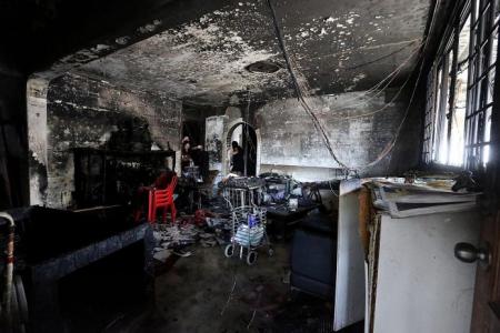 Two sent to hospital after dawn blaze engulfs Yishun flat