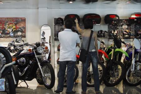 Bikers, dealers react to record-high COE premiums