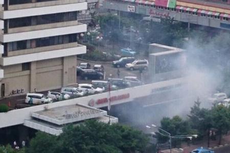 Explosions in Jakarta, gunfire heard
