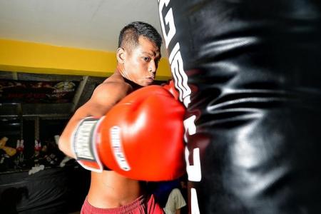 Singapore boxer Syafiq is on a mission to be world champion