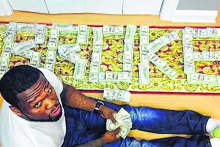 'Broke' 50 Cent bares cash, back in court